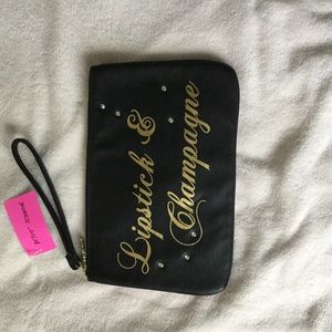 Betsey Johnson oversized wristlet